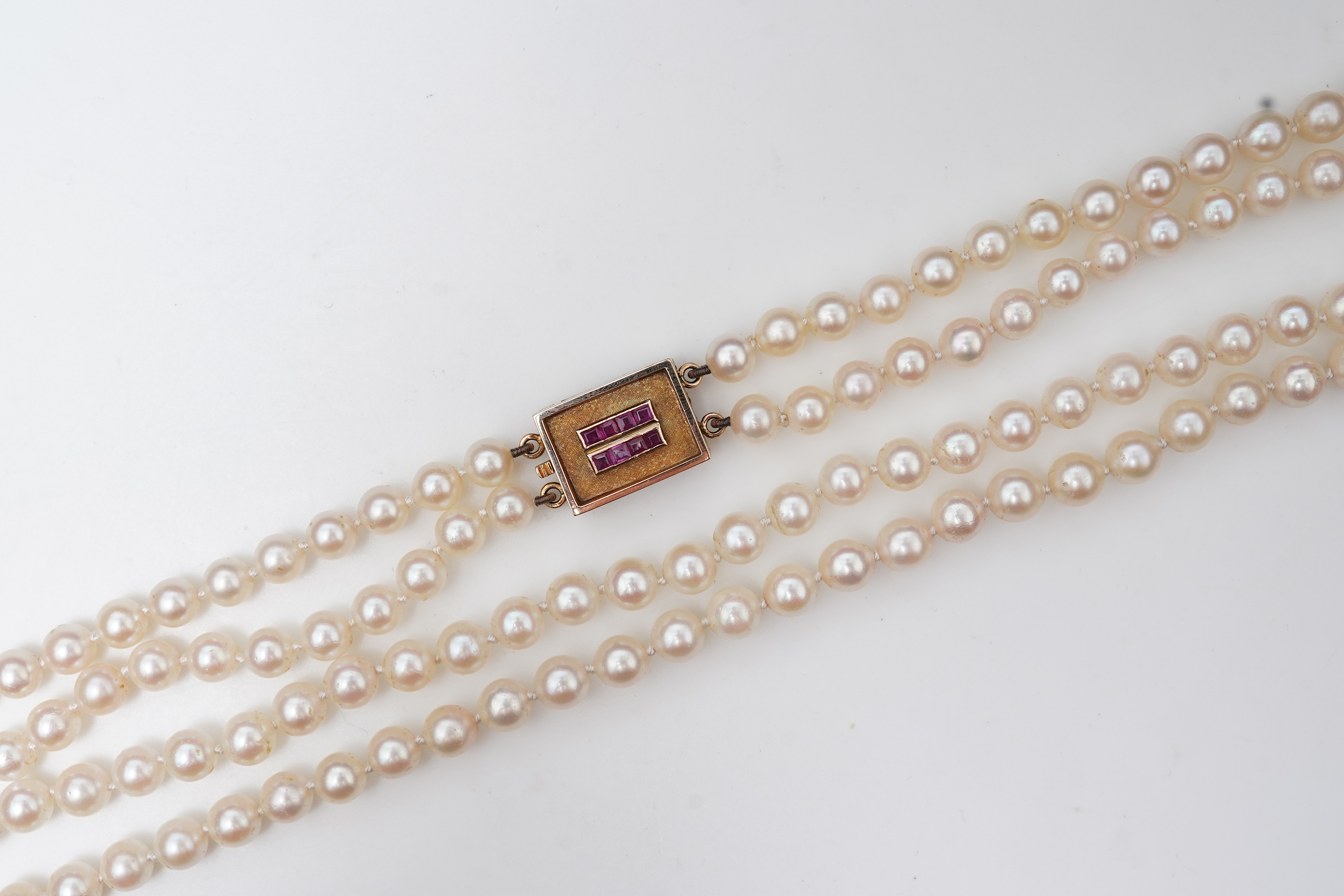 A cultured pearl and ruby necklace